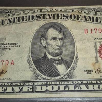 Sale Photo Thumbnail #299: 1953 Red Seal $5 Bill. This is the last year that there was no motto on the back.