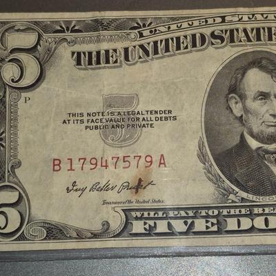 Sale Photo Thumbnail #295: 1953 Red Seal $5 Bill. This is the last year that there was no motto on the back.