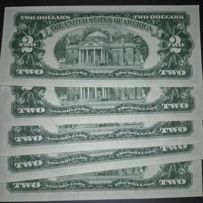 Sale Photo Thumbnail #313: (10) Consecutive 1963 RED SEAL $2 bills, these bills are very crisp and in great condition.