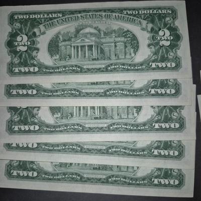 Sale Photo Thumbnail #312: (10) Consecutive 1963 RED SEAL $2 bills, these bills are very crisp and in great condition.