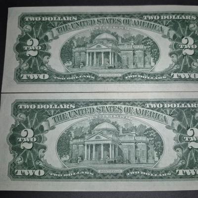 Sale Photo Thumbnail #322: (2) 1953 RED SEAL $2 Bill STAR NOTE, this is also the last year that these were produced without the In God we trust Motto on back, Thes e bills are in great condition, very crisp