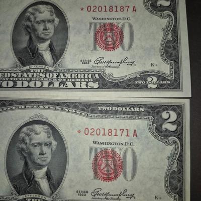 Sale Photo Thumbnail #325: (2) 1953 RED SEAL $2 Bill STAR NOTE, this is also the last year that these were produced without the In God we trust Motto on back, Thes e bills are in great condition, very crisp