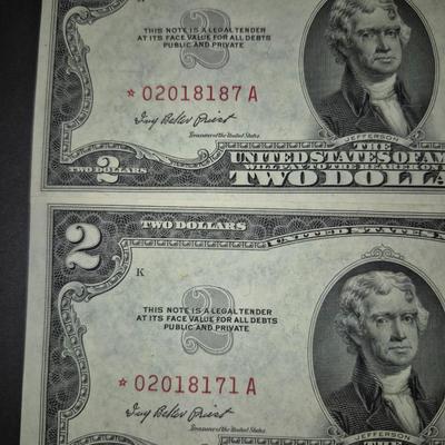 Sale Photo Thumbnail #323: (2) 1953 RED SEAL $2 Bill STAR NOTE, this is also the last year that these were produced without the In God we trust Motto on back, Thes e bills are in great condition, very crisp