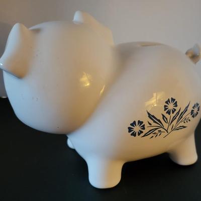 Sale Photo Thumbnail #517: Vintage 1980's Cornflower Blue Piggy Bank England (has a crack but may be from age as pictured)
6 3/4" long 
4 3/4" tall