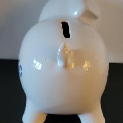 Sale Photo Thumbnail #519: Vintage 1980's Cornflower Blue Piggy Bank England (has a crack but may be from age as pictured)
6 3/4" long 
4 3/4" tall