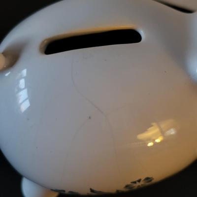 Sale Photo Thumbnail #522: Vintage 1980's Cornflower Blue Piggy Bank England (has a crack but may be from age as pictured)
6 3/4" long 
4 3/4" tall