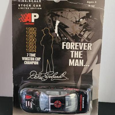 Sale Photo Thumbnail #766: Dale Earnhardt Jr AP Action & Winners Circle ( has crease on top of package as pictured)