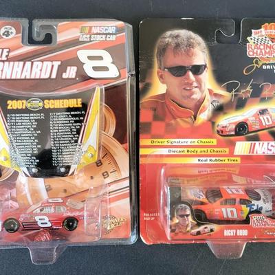 Sale Photo Thumbnail #782: Dale Earnhardt Jr Winners Circle & Ricky Rudd Racing Champions (package is warped as pictured)
