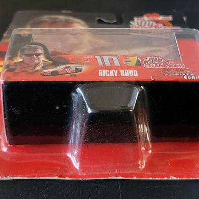 Sale Photo Thumbnail #779: Dale Earnhardt Jr Winners Circle & Ricky Rudd Racing Champions (package is warped as pictured)