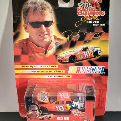 Sale Photo Thumbnail #778: Dale Earnhardt Jr Winners Circle & Ricky Rudd Racing Champions (package is warped as pictured)