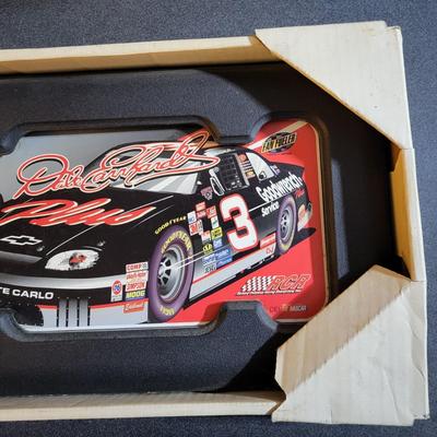 Sale Photo Thumbnail #793: Dale Earnhardt Jr Clock with License Plate Holder 
(Box measures 56"L×25"W×6"H)