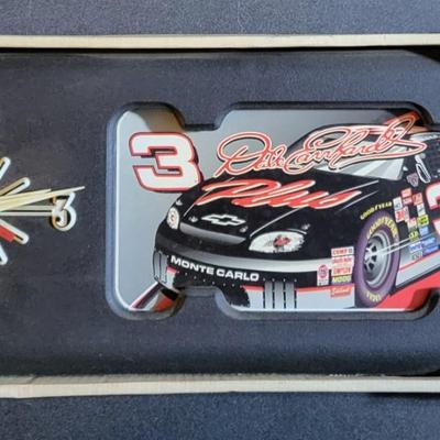 Sale Photo Thumbnail #790: Dale Earnhardt Jr Clock with License Plate Holder 
(Box measures 56"L×25"W×6"H)
