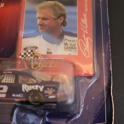 Sale Photo Thumbnail #807: Dale Earnhardt & Rusty Wallace Winners Circle (Both have damage to packages as pictured, are sealed)