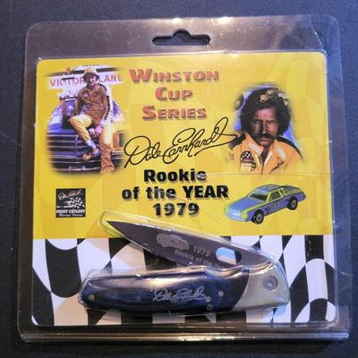 Sale Photo Thumbnail #864: Dale Earnhardt Lighter & Rookie of the Year Knife (package has cut as pictured, unopened)