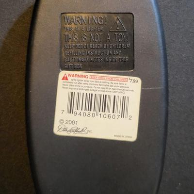 Sale Photo Thumbnail #871: Dale Earnhardt Lighter & Rookie of the Year Knife (package has cut as pictured, unopened)