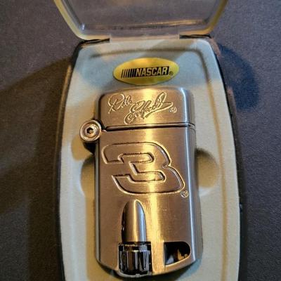 Sale Photo Thumbnail #868: Dale Earnhardt Lighter & Rookie of the Year Knife (package has cut as pictured, unopened)