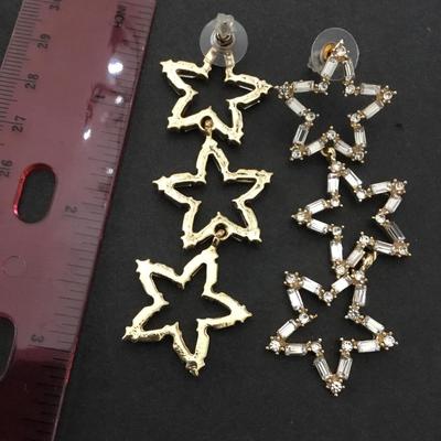 Beautiful gold tone very nice crystal star statement earrings