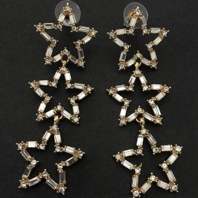 Beautiful gold tone very nice crystal star statement earrings