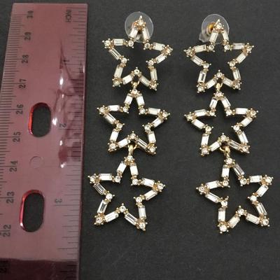 Beautiful gold tone very nice crystal star statement earrings