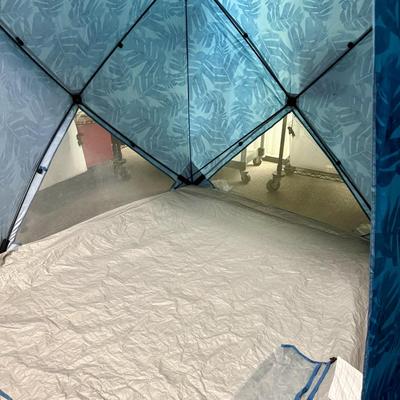 Sale Photo Thumbnail #370: Dark blue nylon walls with mesh panels to allow airflow.  Large enough to hold 2 pop-up or folding chairs.  Great for places like the beach or anyplace shade is needed. Includes carry bag and stakes. Very good used condition.