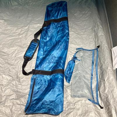 Sale Photo Thumbnail #372: Dark blue nylon walls with mesh panels to allow airflow.  Large enough to hold 2 pop-up or folding chairs.  Great for places like the beach or anyplace shade is needed. Includes carry bag and stakes. Very good used condition.