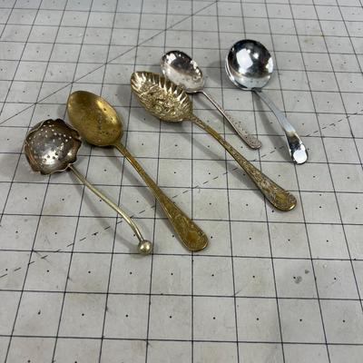 5 interesting Brass and Silver Spoons  