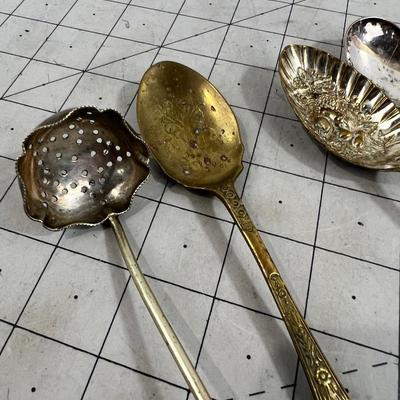 5 interesting Brass and Silver Spoons  