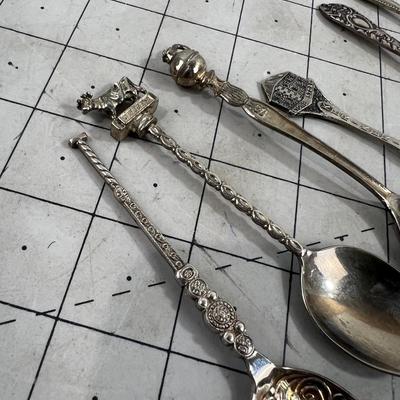 5 interesting Brass and Silver Spoons  