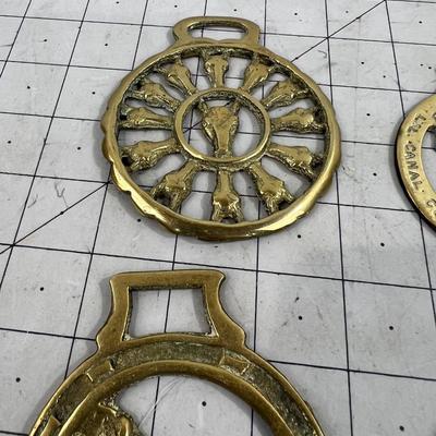 4 Horse Brasses with Lucky horses on them