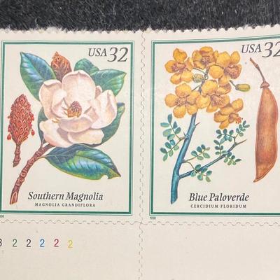 Sale Photo Thumbnail #388: The stamps are Scott #3193-3197 in the catalog. The set features illustrations of the Southern Magnolia, Blue Paloverde, Yellow Poplar, Prairie Crab Apple, and Pacific Dogwood