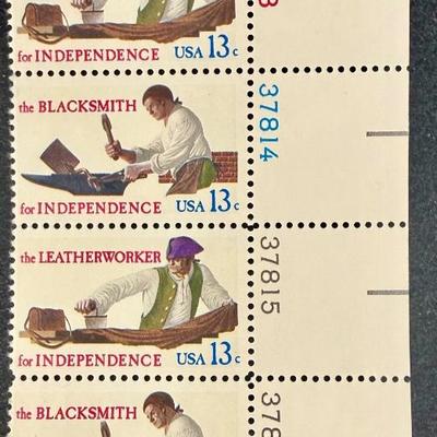 Sale Photo Thumbnail #68: Mint condition plate blocks of the 1977 US 13-cent Skilled Hands for Independence commemorative stamps (Scott #1717-1720). Issued on July 4, 1977, in Cincinnati, Ohio, the stamps honor the essential civilian tradespeople who supported the American Revolut