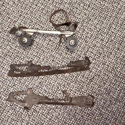 PAIR OF ANTIQUE ICE SKATES AND 1 ROLLER SKATE