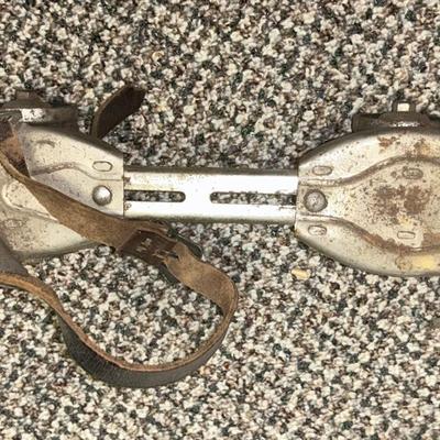 PAIR OF ANTIQUE ICE SKATES AND 1 ROLLER SKATE