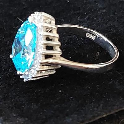 Treated Topaz and white sapphire Ring