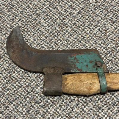 BRUSH HOOK TOOL AND AN ADZE