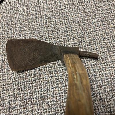 BRUSH HOOK TOOL AND AN ADZE