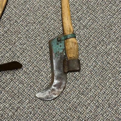 BRUSH HOOK TOOL AND AN ADZE