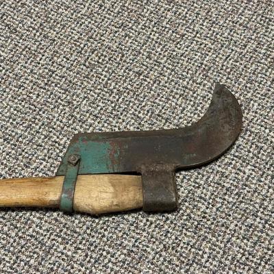 BRUSH HOOK TOOL AND AN ADZE