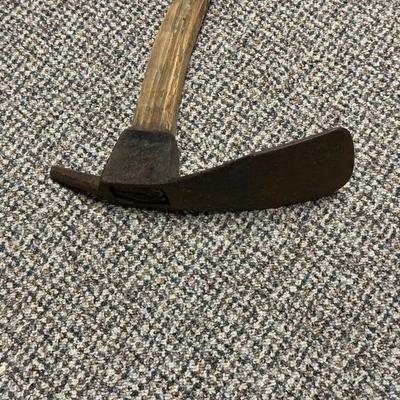 BRUSH HOOK TOOL AND AN ADZE