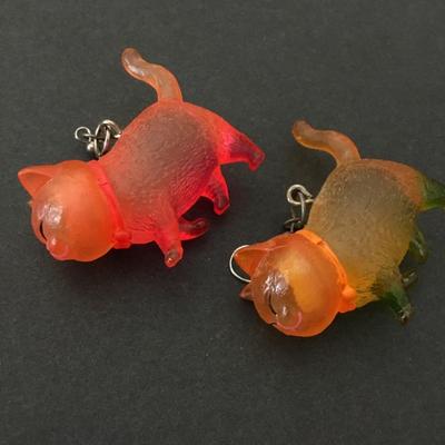 Orange and pink translucent resin cat earrings