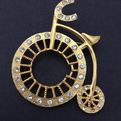 Cute, vintage, gold tone, rhinestone tricycle brooch