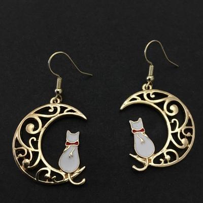 Beautiful, gold, toned, white enamel, cat crescent, moon earrings