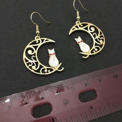 Beautiful, gold, toned, white enamel, cat crescent, moon earrings