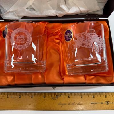 Sale Photo Thumbnail #442: vintage Thomas Webb or Webb Continental Rolls-Royce owner's club commemorative whiskey glasses (rocks glasses. They feature etched or engraved illustrations of vintage Rolls-Royce cars and come in a presentation box with an orange satin lining.