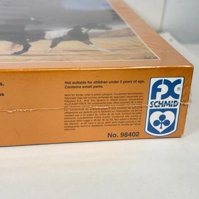 LOT 21: NIP Puzzles: Regal Castle, Springbok, FX Schmid & More