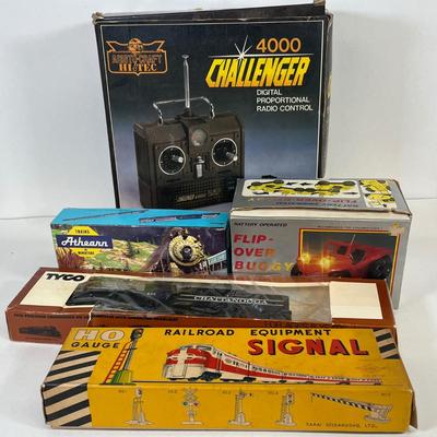 LOT 35: Vintage Toys - Tyco Locomotive, RC Controller and More