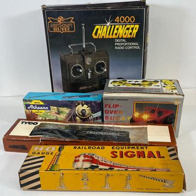 LOT 35: Vintage Toys - Tyco Locomotive, RC Controller and More