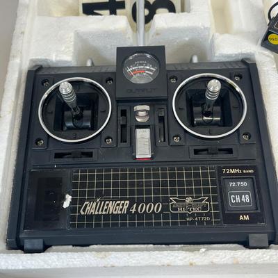 LOT 35: Vintage Toys - Tyco Locomotive, RC Controller and More