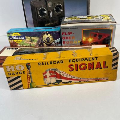 LOT 35: Vintage Toys - Tyco Locomotive, RC Controller and More