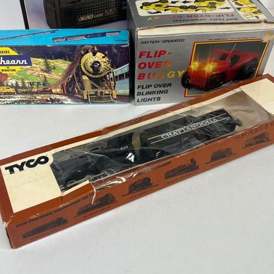 LOT 35: Vintage Toys - Tyco Locomotive, RC Controller and More